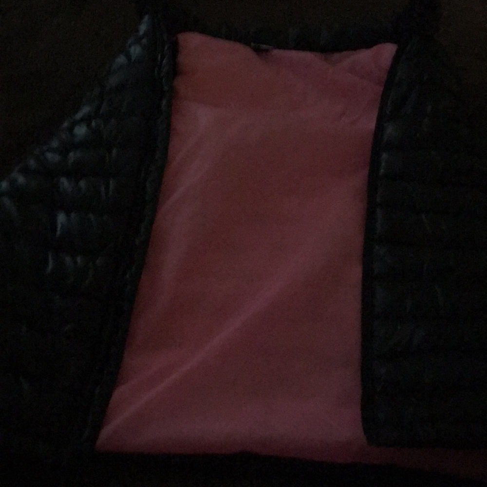 A pink and black vases